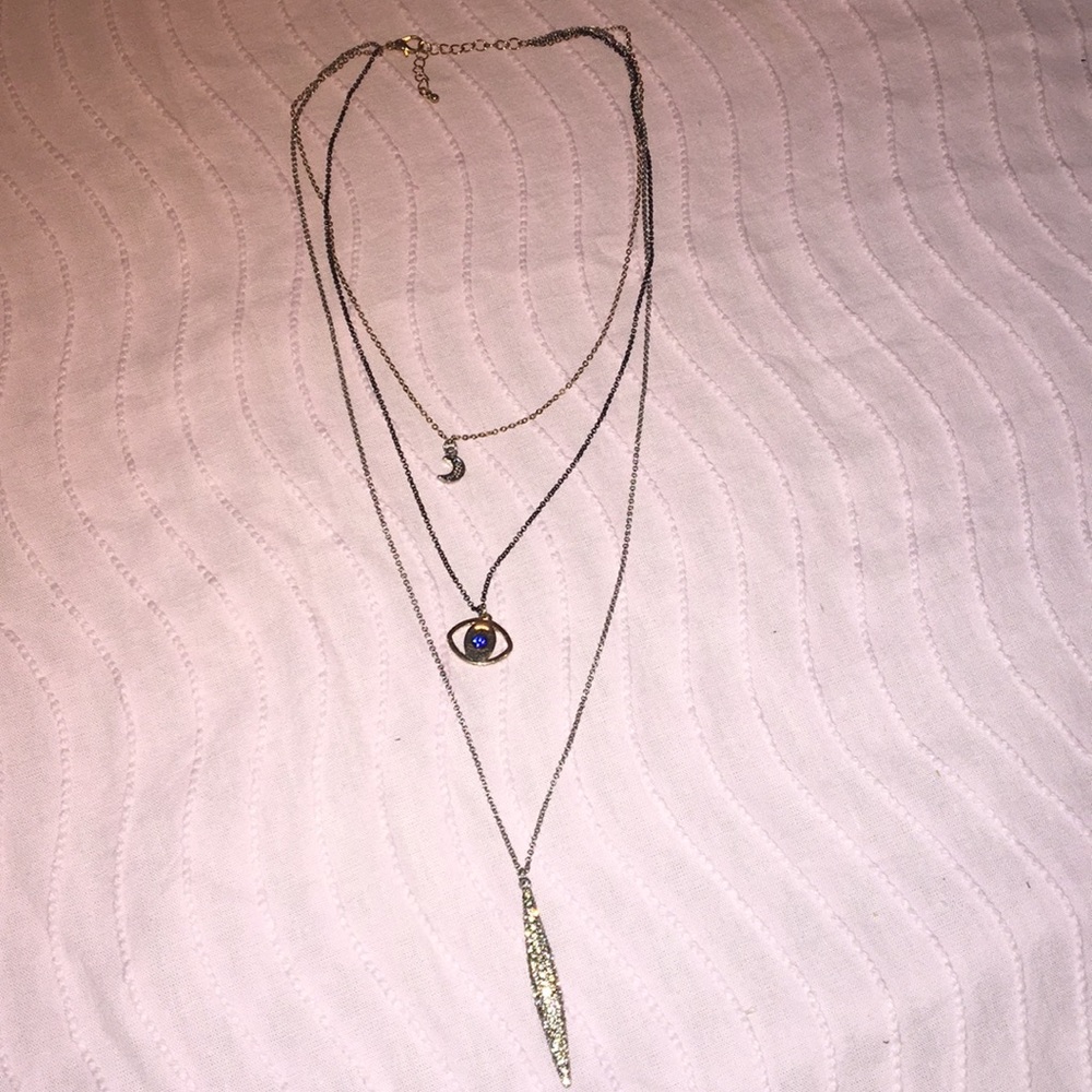 Multi layered, gold, silver and black necklace